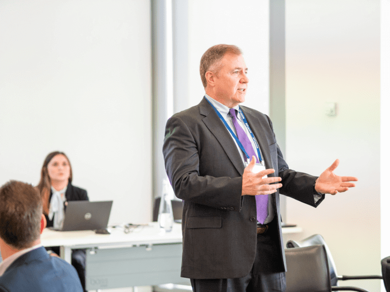 Man speaking to room