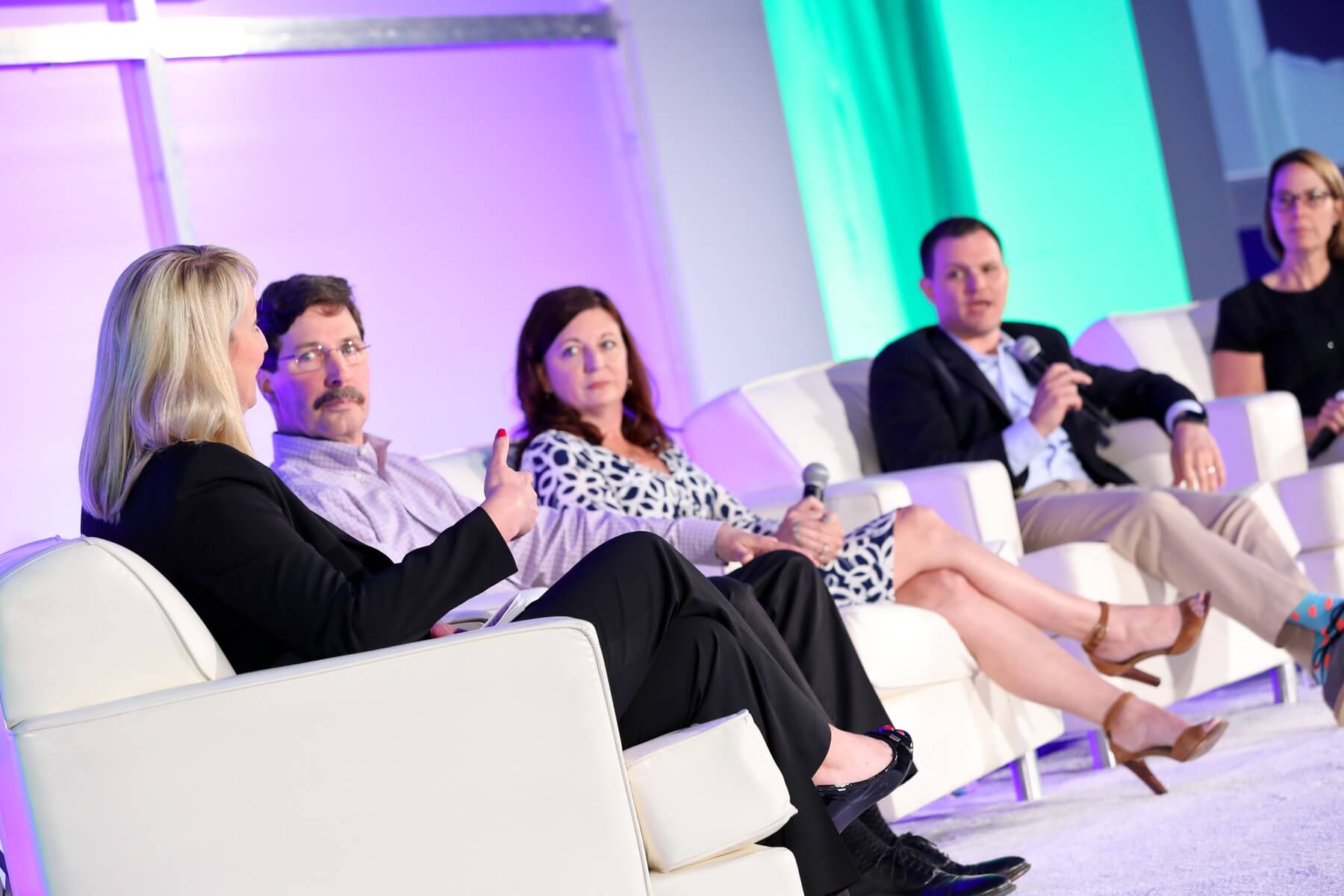 Businesspeople sitting in chairs