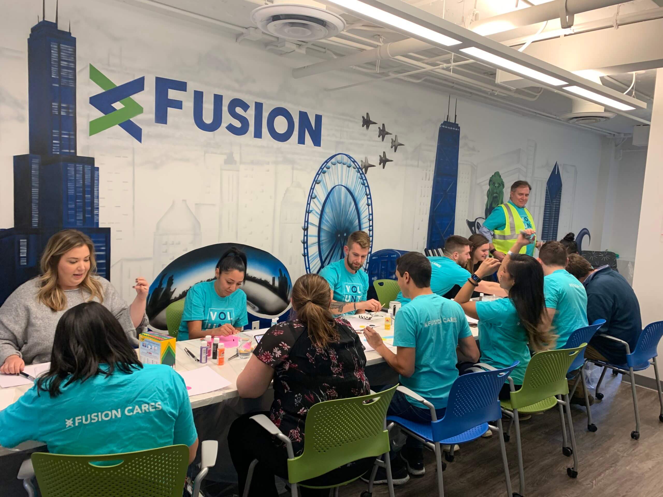 Fusion cares photo from painting day - Fusion Risk Management