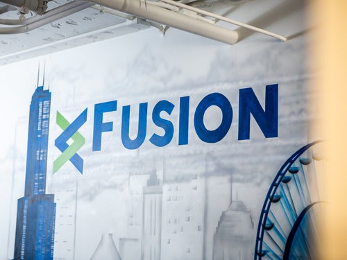Fusion logo on glass wall