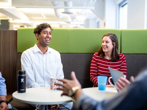 Happy people sitting and laughing