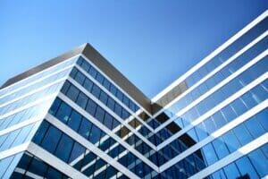 New office building in business center. Wall made of steel and g